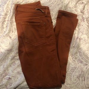 Urban Outfitters Orange-rust colored jeans